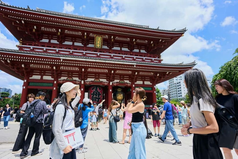 Asakusa: 2-Hour History Walking Tour & Local Food Tasting - Samurai sword and ninja gear store, with fun merch you can actually shop