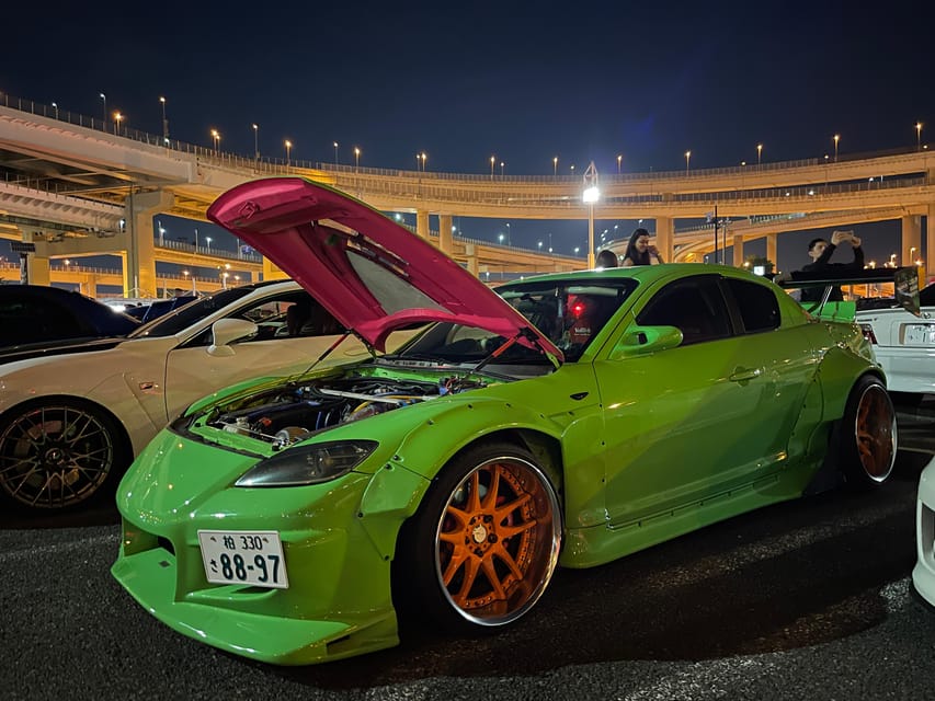 Daikoku Parking Area : JDM car meet tour by a local Japanese - Rainbow Bridge and the Tokyo skyline passing moments