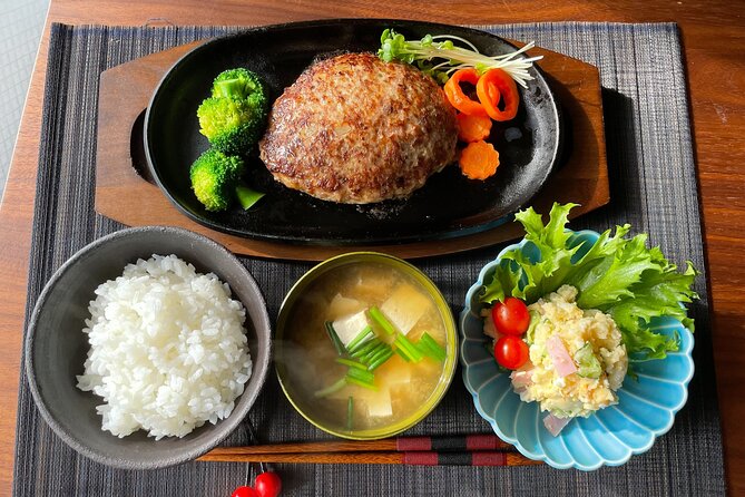Ebisu Food Tasting Experience with Japanese Cooking Class - Cooking in a cozy home kitchen, step by step