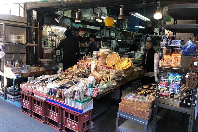 From Ocean to Chopsticks Tsukiji Market Food Tour By Local Expert - Entering Tsukiji Hongwanji Temple before the food sprint