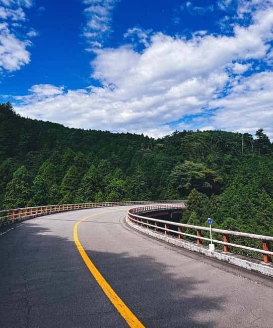 From Tokyo: Private Motorcycle Tour - Fuji, Hakone, Onsen - Riding Back Into Tokyo: Rainbow Bridge Adds a Finale
