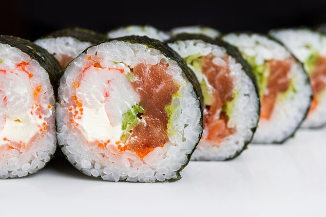 Giant Sushi Cooking Class: Make a 1.5m Sushi Roll in Tokyo - Cutting, plating, and eating your giant maki