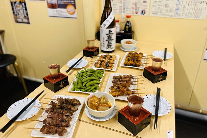 Japanese Food Experience Night Tour in Ueno - Ameyoko Shopping Street at Evening Pace