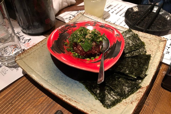 Sangenjaya Back Alleys Private Food and Drink Tour - The hidden sake izakaya: seafood bites and nihonshu