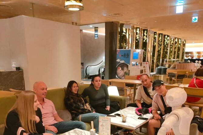 Shibuya Hidden Flavors A Family Friendly Foodie Tour With Guide - Stop 1: Shibuya 109, Local Street Energy and Izakaya Choices