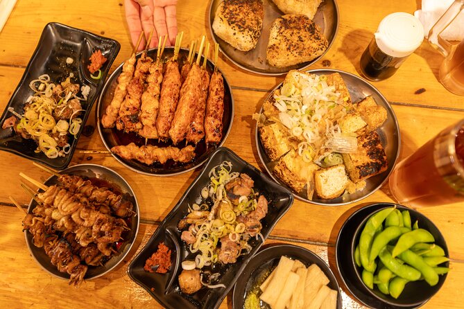 Shinjuku Underground Nightlife Tour: Izakaya Food & Bar Hopping - Kabukicho Neon, Godzilla Road Photos, and the Quick Reality Check