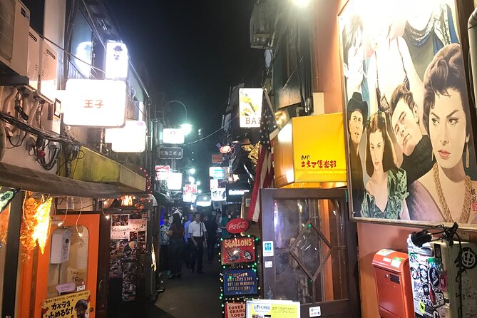 The Dark Side of Tokyo - Night Walking Tour Shinjuku Kabukicho - Godzilla Head: Pop Culture, Lights, and a Quick Break from the Crowd