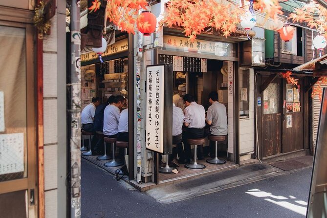 Tokyo After 5: Authentic Japanese Food & Drink Night Tour - Stop 1: Mitsukoshi Ginza, sweet buys and the after-5 kickoff