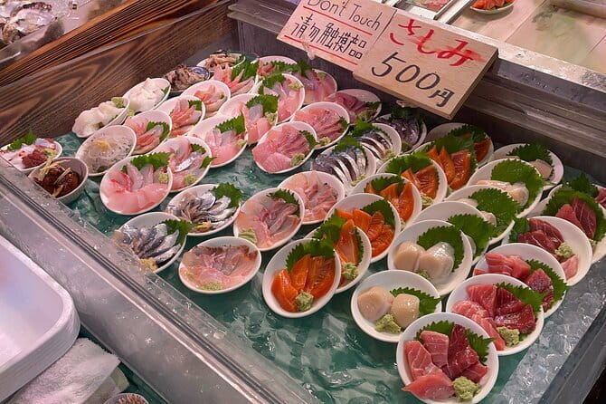 Tokyo:Enjoy street food & Japanese food culture at Tsukiji Market - Starting at Tsukiji Hongwanji Temple, where sea prayers meet food