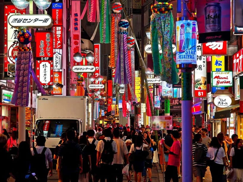Tokyo: Evening Tour - Temples, Neon Streets & Culture - Shibuya Crossing: neon billboards and pedestrian chaos, but managed