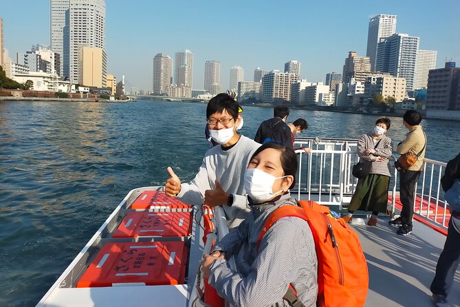 Tokyo Private Sightseeing Tour by Bike with Water Bus - Tsukishima Monjya street: snack time with texture