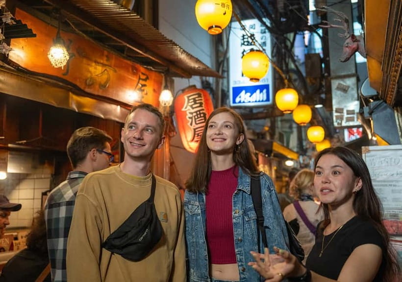Tokyo: Shinjuku Bar Hopping & Night Walking Tour - Omoide Yokocho: Red-lantern izakaya dinner with reservations