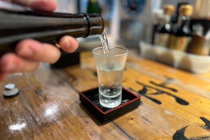 Tokyo: Shinjuku Food Tour (13 Dishes at 4 Local Eateries) - Stop 1: Omoide Yokocho and the Art of Eating in Tiny Lanes
