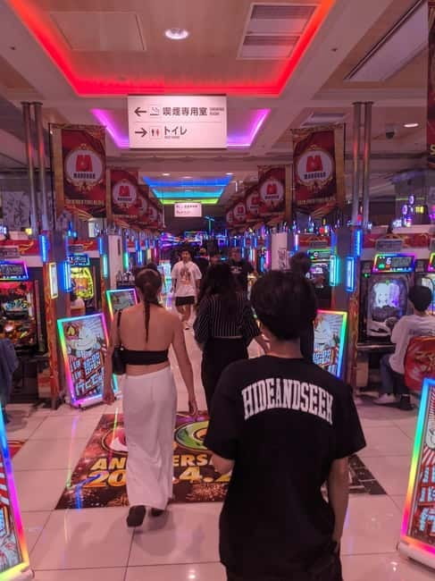 Tokyo Shinjuku : Private Walking Night Tour with Pachinko - Hanazono Shrine, A Calmer Pause Between Loud Streets