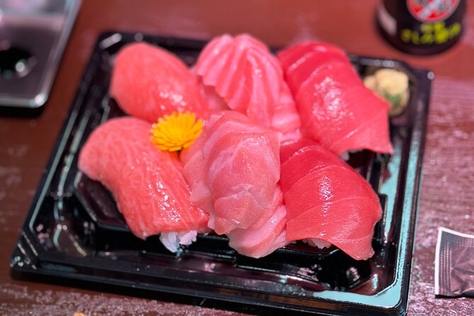 Tokyo: Tsukiji Fish Market Food and Walking tour - Stop 1: Tsukiji Hongwanji Temple, a Quiet Reset Before the Food