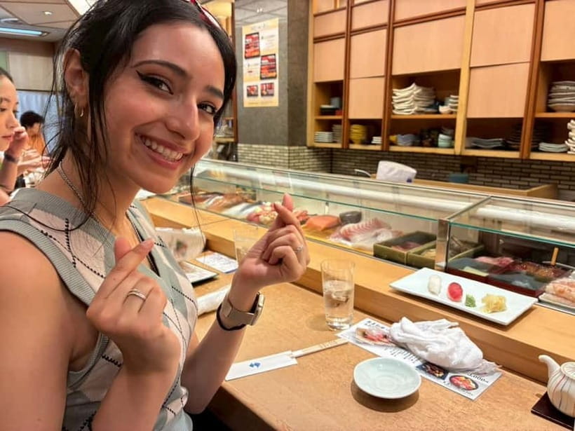 Tokyo: Tsukiji walk & sushi private tour with Uni Students - Why Tsukiji Honganji Temple is a smart first stop
