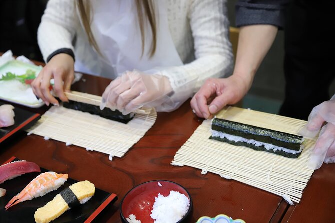 Tsukiji Fish Market Guided Tour and Sushi Making with Pro Chef - Outer Tsukiji walkthrough: seeing seafood supply chain up close